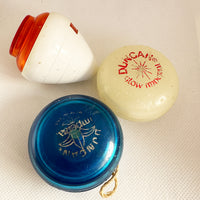 Lot of 3 Vintage Duncan Yo-yos and spin top. Fair condition. Glow, Top, Imperial